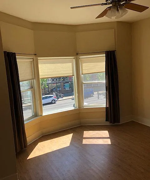 Bay windows allow for light and 12 foot ceilings make this great studio feel big!