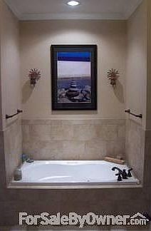 Private, jetted master soaking tub
						:
						Get away from it all in your sequestered master bath. Walk in, 2 headed shower.