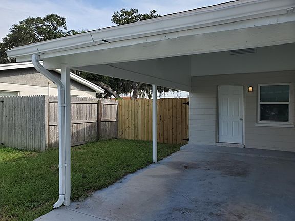 Carport with secure backyard