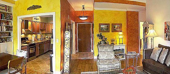 Gleaming hardwood floors grace the living/dining rooms