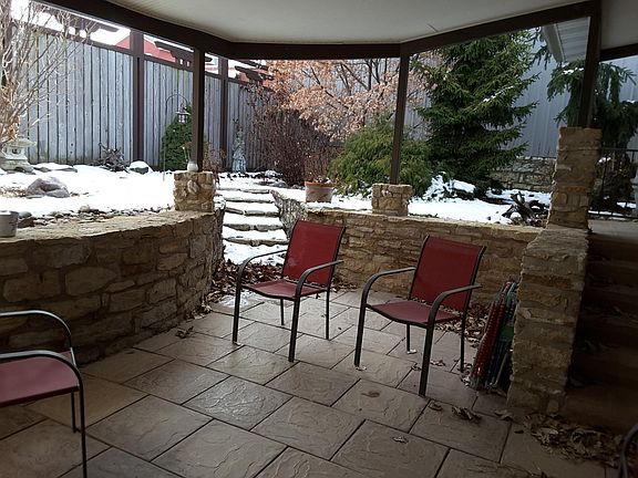 Covered back patio with Japenese Garden.