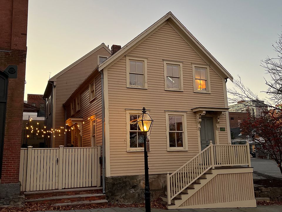 Street view. House is two seperate units. Front apartment has two floors and is currently occupied. Back unit is for rent and has three floors and access is through alleyway gate.