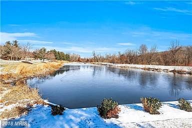 Community Pond on wooded acreage