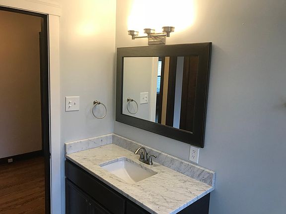 Remodeled Bath with Marble Countertop