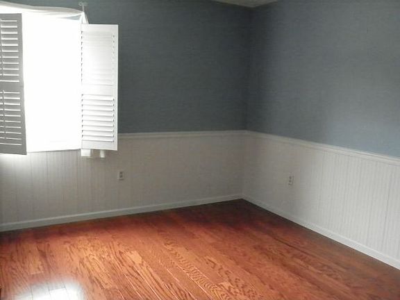 Master Bed - real wood floors