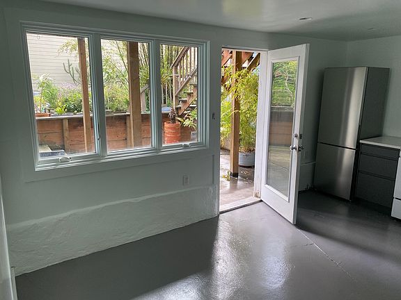 Outside the kitchen door into your backyard space.