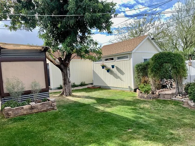 Large, 100% private backyard with lots of plants and large tree!