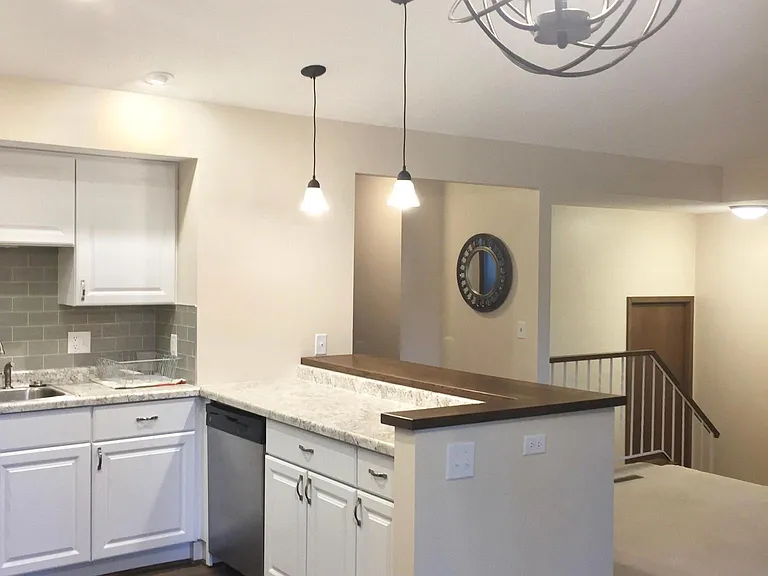 New light fixtures throughout.