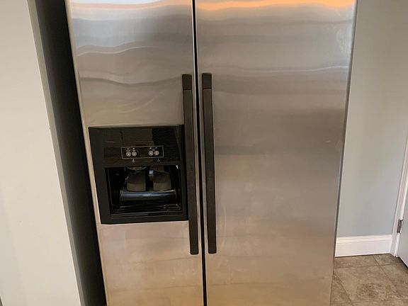 Stainless steel french door fridge with ice marker and water fountain