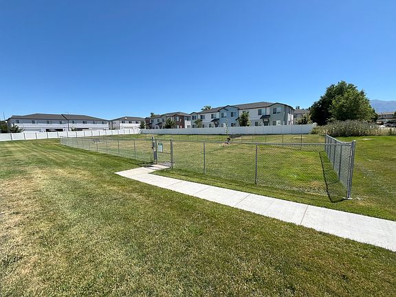 Adjacent to the community is a large, fenced in dog park for the furry member of the family. Not seen, but just around the corner, is a children's daycare facility, making your commute that much easier!