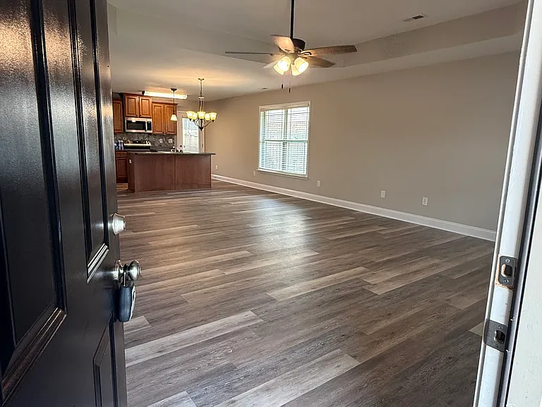 family room with new floors and paint