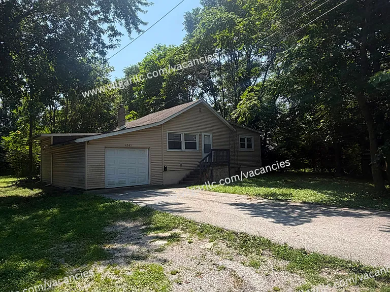 6065 E 6th Pl — Photo 2