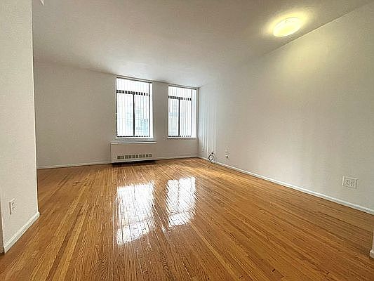 2nd image of 121 E 12th St APT 5C
