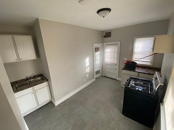 Kitchen from where the refrigerator sits. BRAND NEW Fridge - Just wasn't delivered by the time the picture was taken.