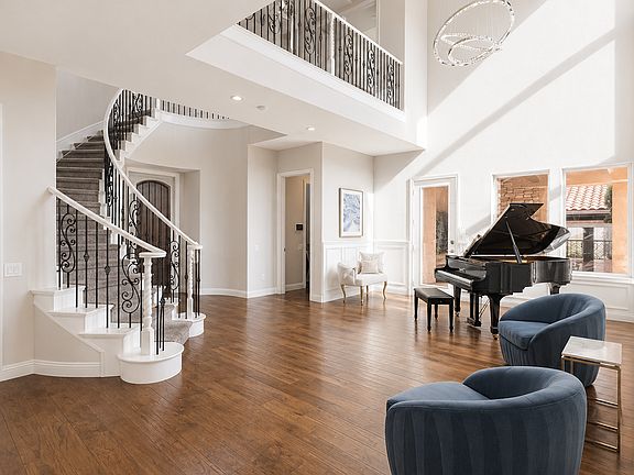 Foyer, 22 high ceiling with hardwood floors throughout