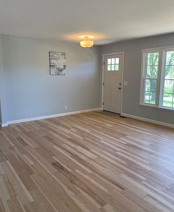 Front Door Leading Into A Bright & Spacious Open Living Area.