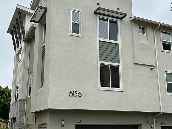 Back of home and garage entry