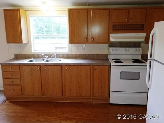 Window overlooks back yard