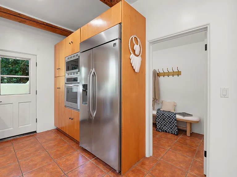 To large patio to left, large oversized laundry and second pantry to the right