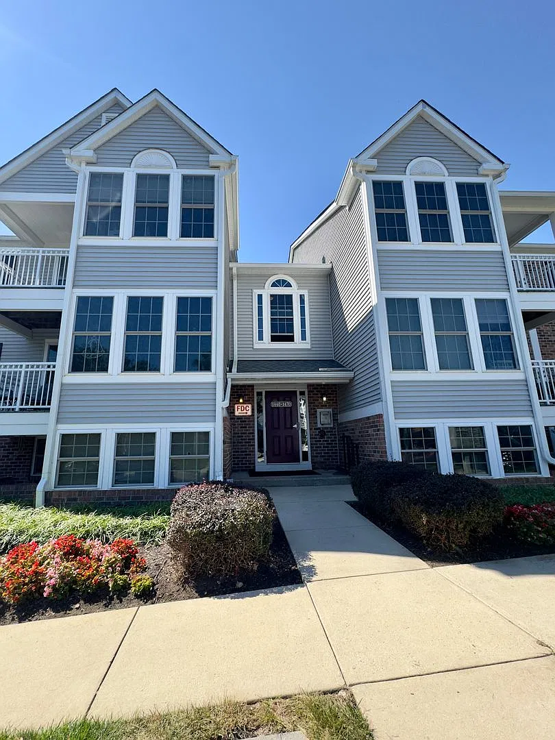 Spacious 2BD/1BA Condo with Sunroom & Private Balcony in Pikesville, MD! — Photo 1