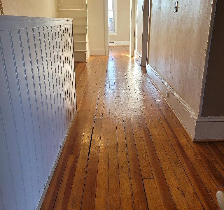 The main foyer of the apartment leads to the office at the end!