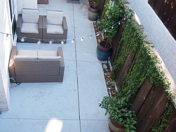 Balcony view of large outdoor patio