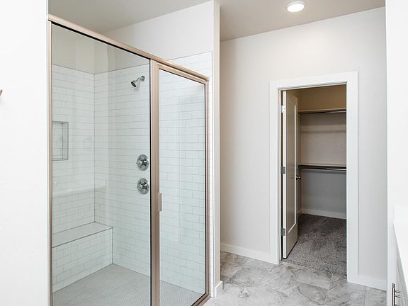 Amazing master bath with large shower and walk in closet