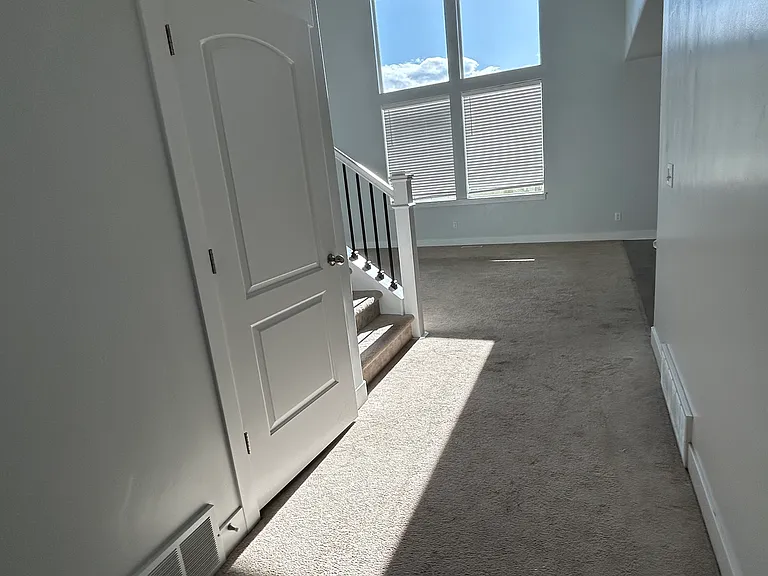 Hallway with basement door