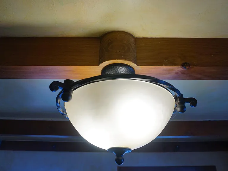Living Room Dimmed light and beam.