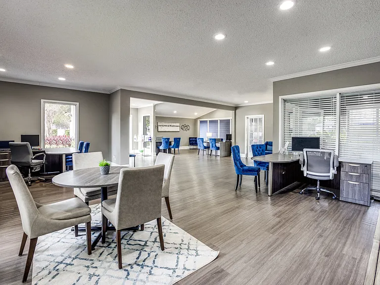 Community leasing area with comfortable seating.