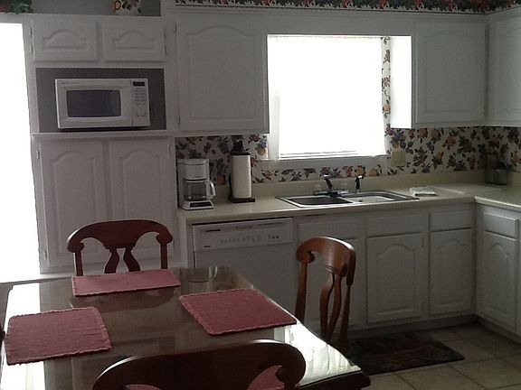 Full kitchen with dining