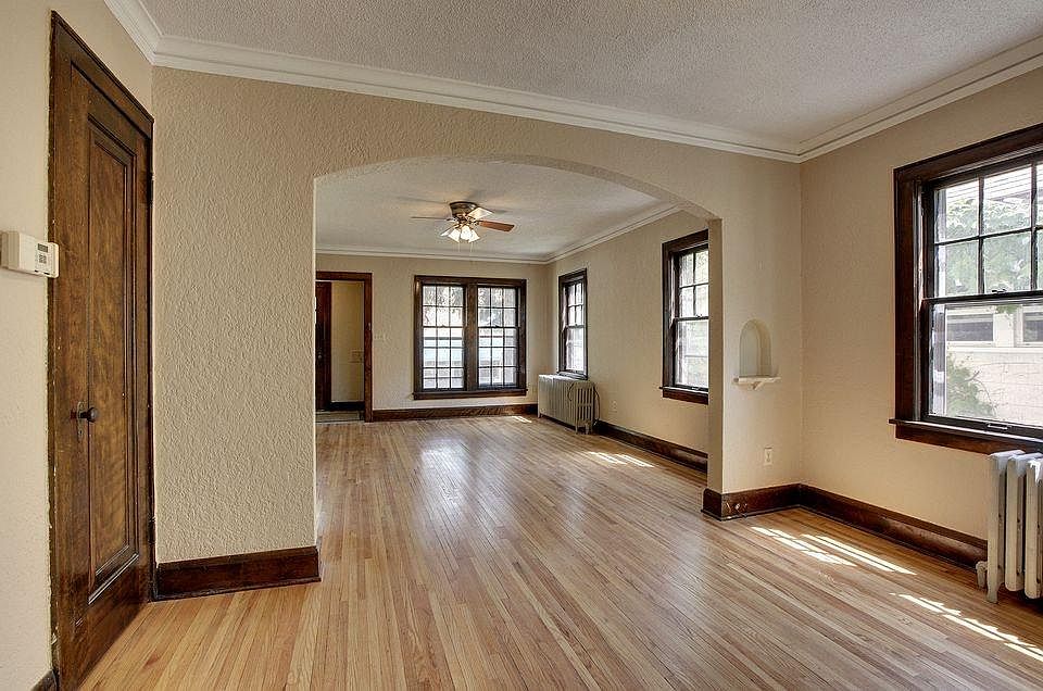 Spacious living area with maple hardwood