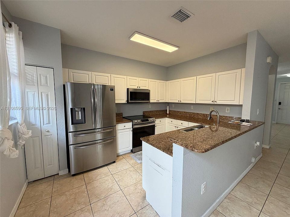 1st image of 12989 SW 135th Ter #0