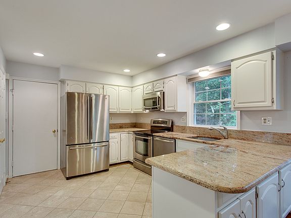 Bright kitchen with stainless steel appliances