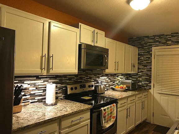 Large galley kitchen open to the main living room