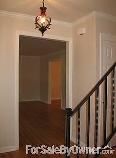 Front Hallway
						:
						Living Room and Dining Room beyond
