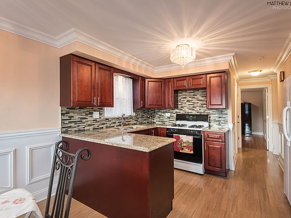 5th image of 7752 S Melvina Ave