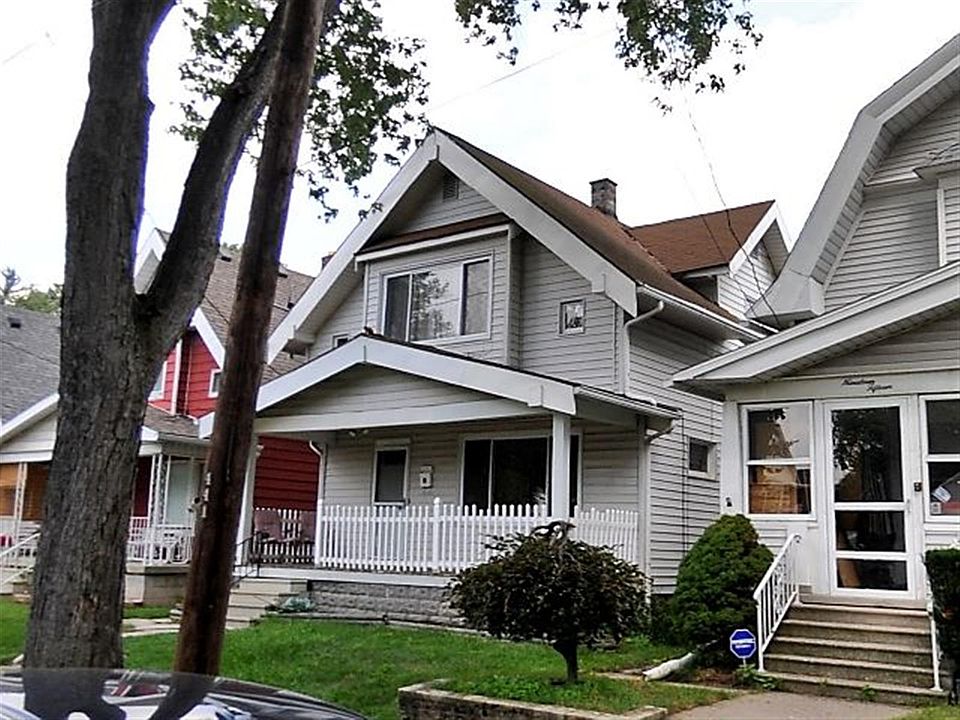 1911 Mason 3 bed 2 story new energy windows and furnace, full basement, fenced yard pets ok