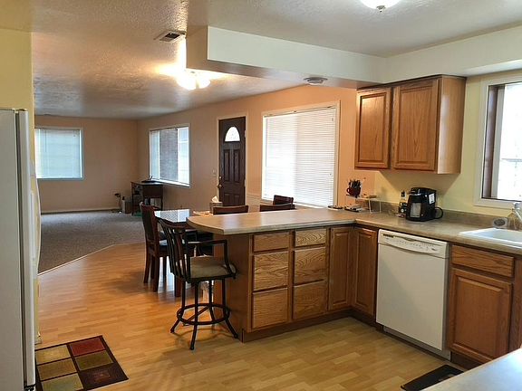Kitchen through Dining area to living room