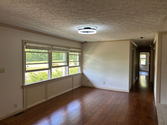 living room with new ceiling light and fan