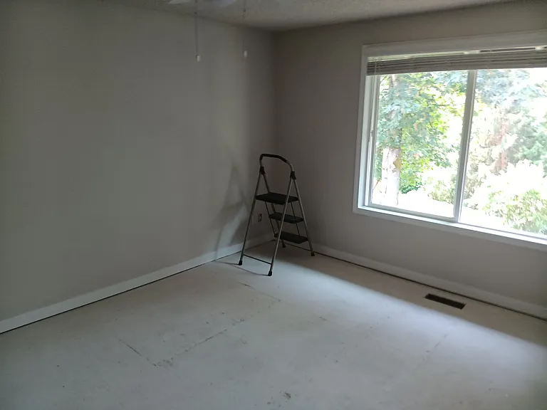 Main bedroom looking over green belt/backyard
