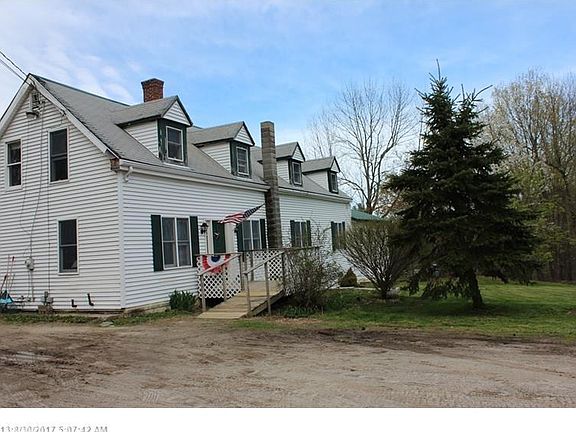 1840 farmhouse with many updates and many original features. Green metal roof on the 2010 Addition i