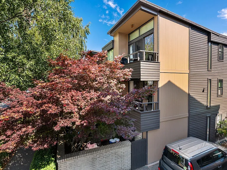 Aerial view of apartment and parking space, including unit #103
