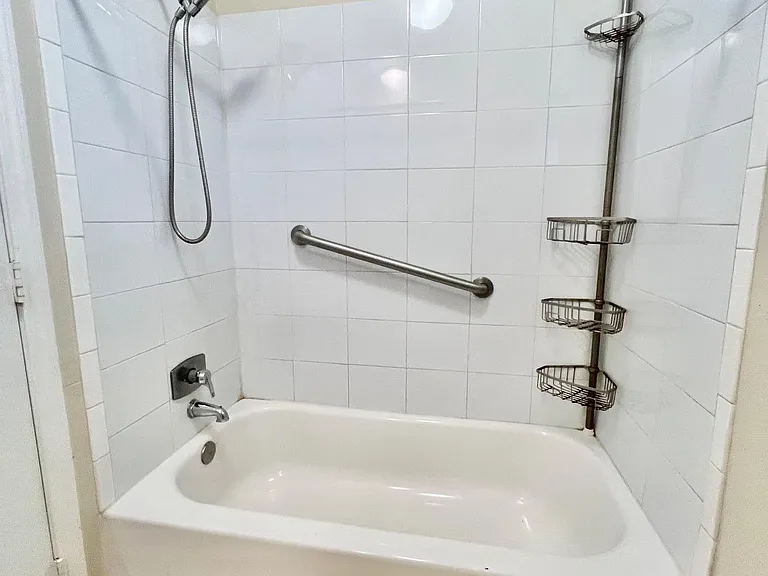 Primary shower/tub combo.