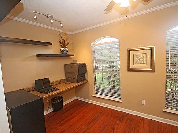 Through the French doors is this flex space