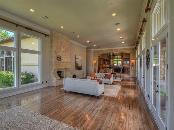 Open plan living with two seating areas, plus dining space. An entertainers dream. 5 sets of french doors for indoor/outdoor living