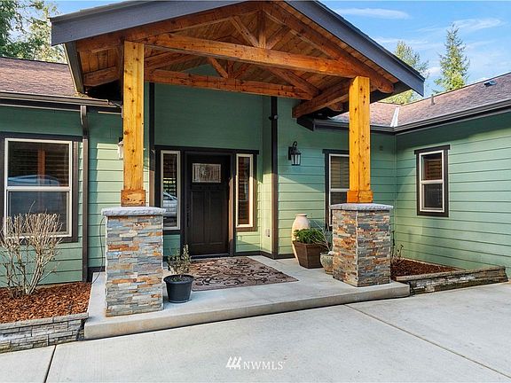 Custom covered porch with cedar tongue & groove.