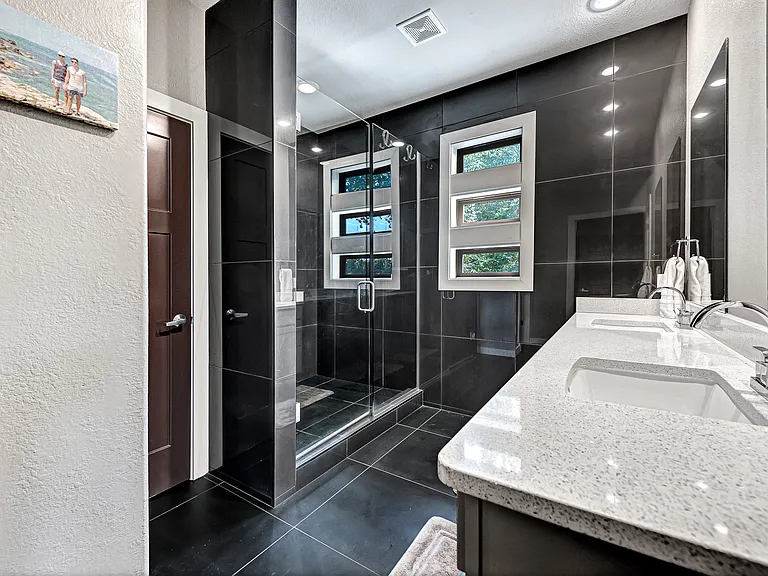 The primary bathroom with a spa-like shower.