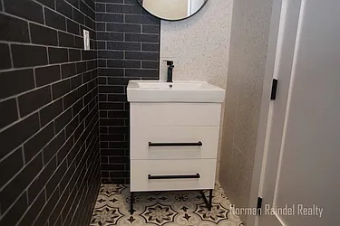 Rented by Norman Raindel, LREB