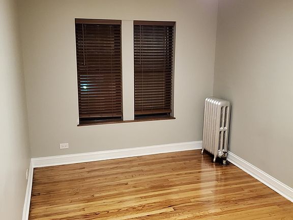 7234-2N: Two Bedrooms with hardwood floors, ceiling fan, radiant heat, faux wood 2in blinds